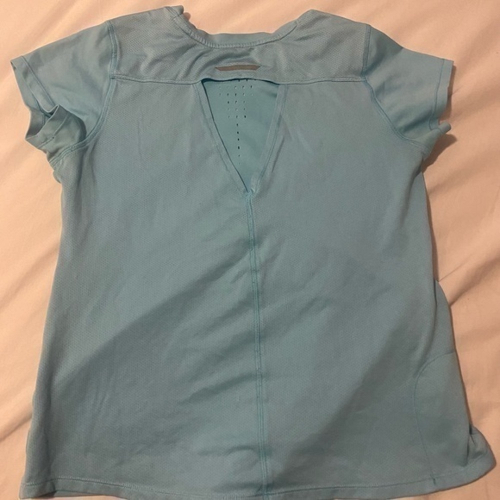 Champion blue exercise tee shirt. Breathable fabric, size medium